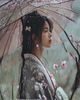 友田真希写真集桜雨封面，樱花雨中友田真希身着和风服饰优雅伫立，画面唯美浪漫